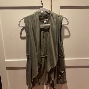 Francesca’s green vest